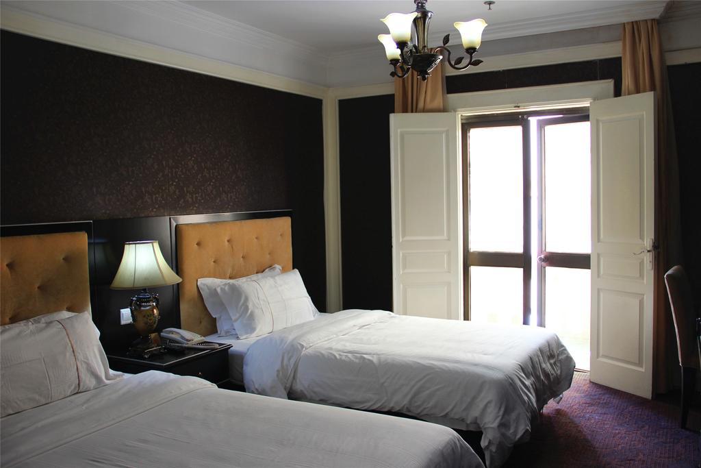 Manhattan Jinling Hotel Σανγκάη Δωμάτιο φωτογραφία